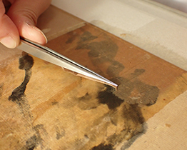 揭除舊有小托命紙層